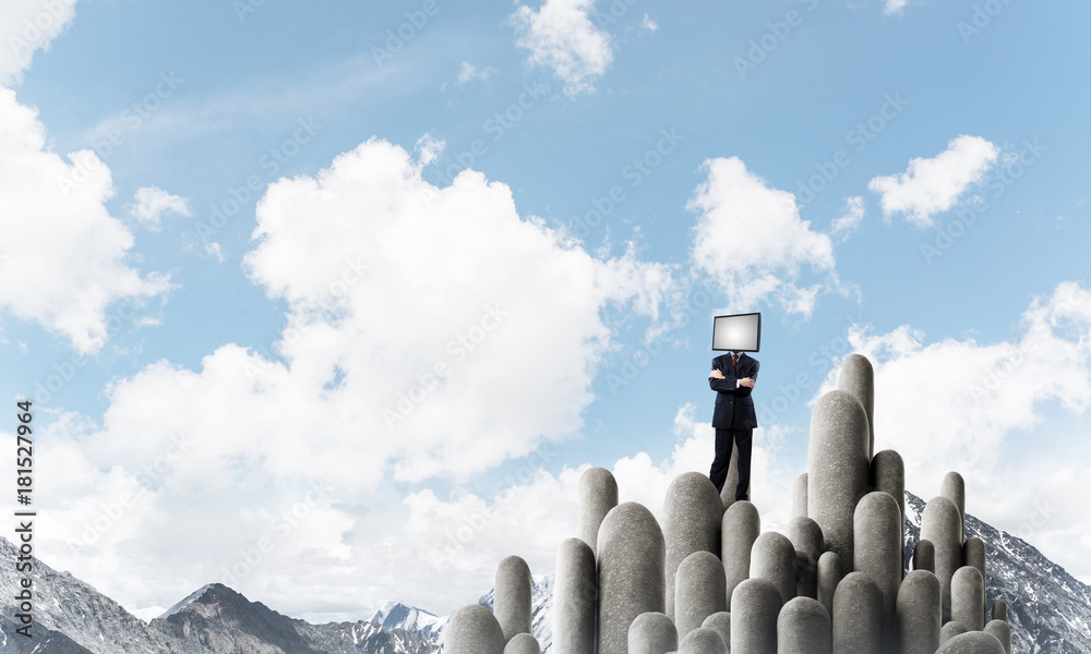 Businessman with TV instead of head.