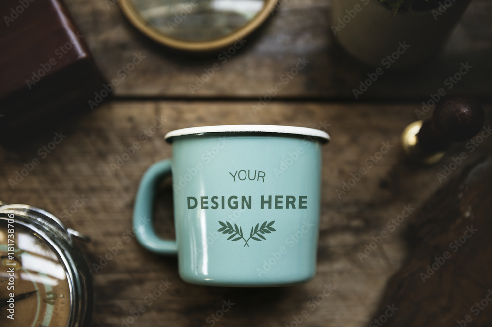 Aerial view of blue cup on wooden table