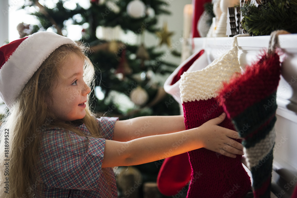 Young Caucasian girl enjoying Christmas holiday