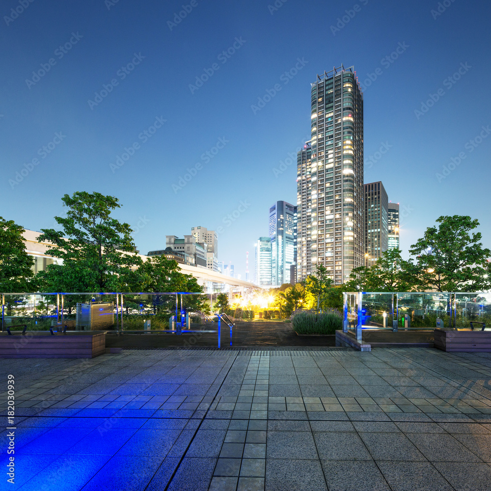 modern buildings in modern city at night