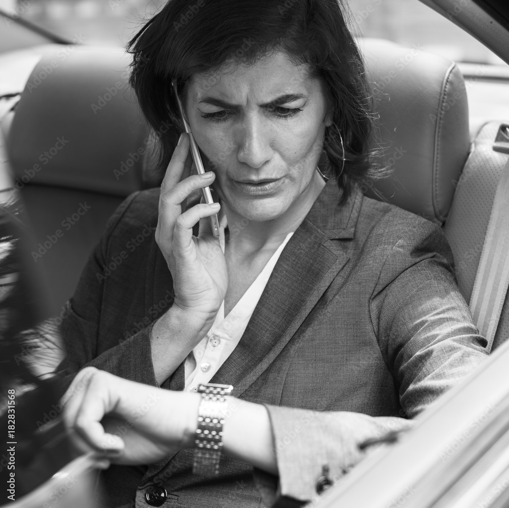 Businesswoman Talking Using Phone Car Inside