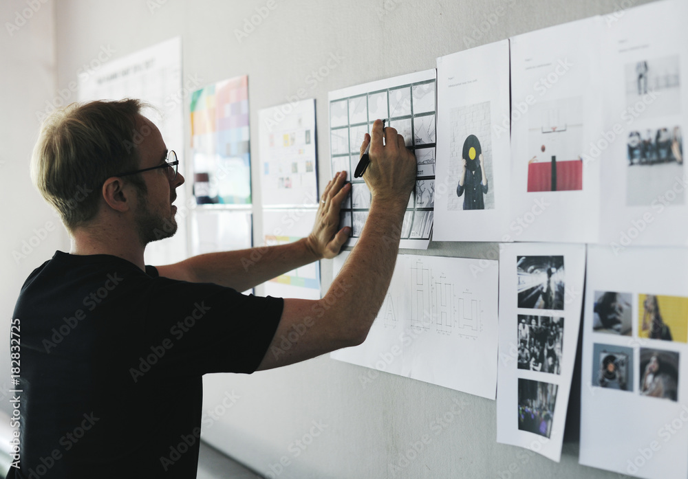 Startup businessman  working on a board