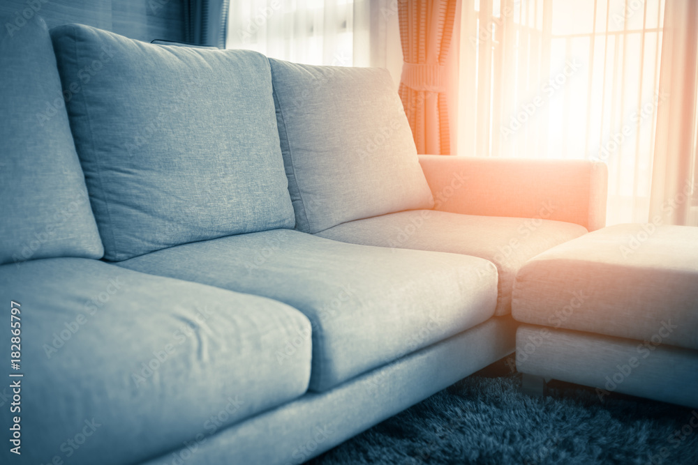 contemporary interior of Living room with part of sofa in sunny day and  interior background concept