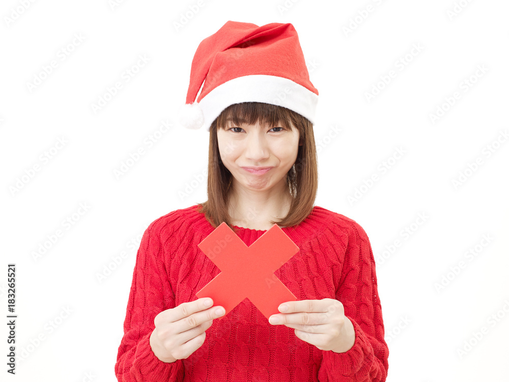 女性　クリスマス　ばつ印