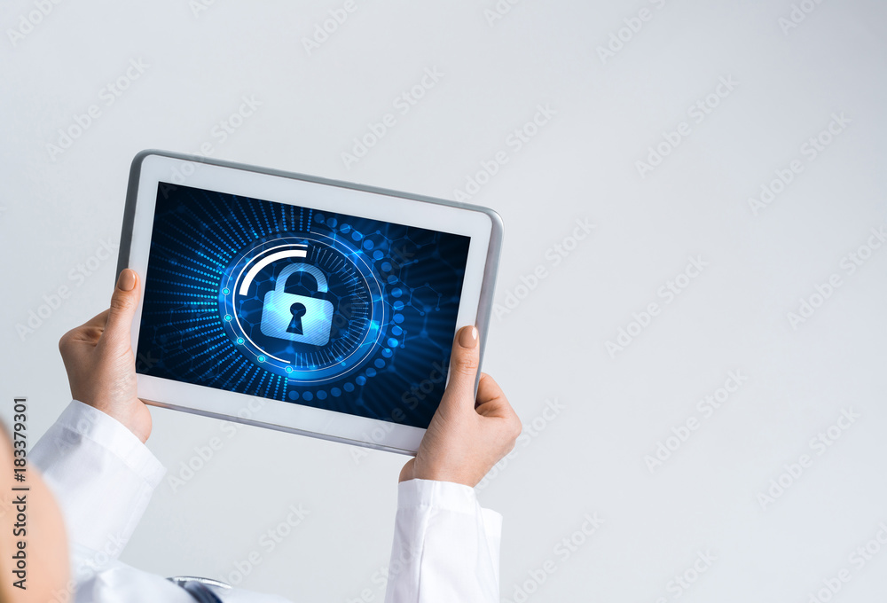 Close of female doctor hands working with tablet pc computer