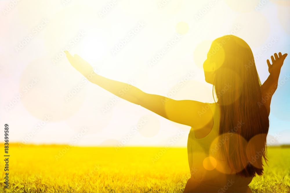 Woman on field background.