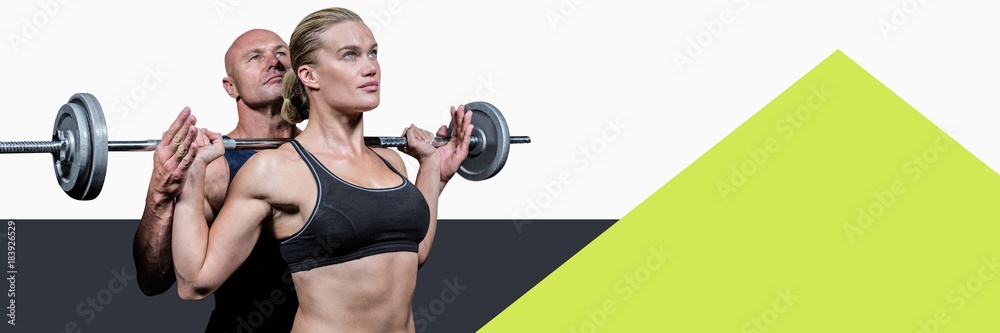 Fitness trainer man with minimal shapes training woman with