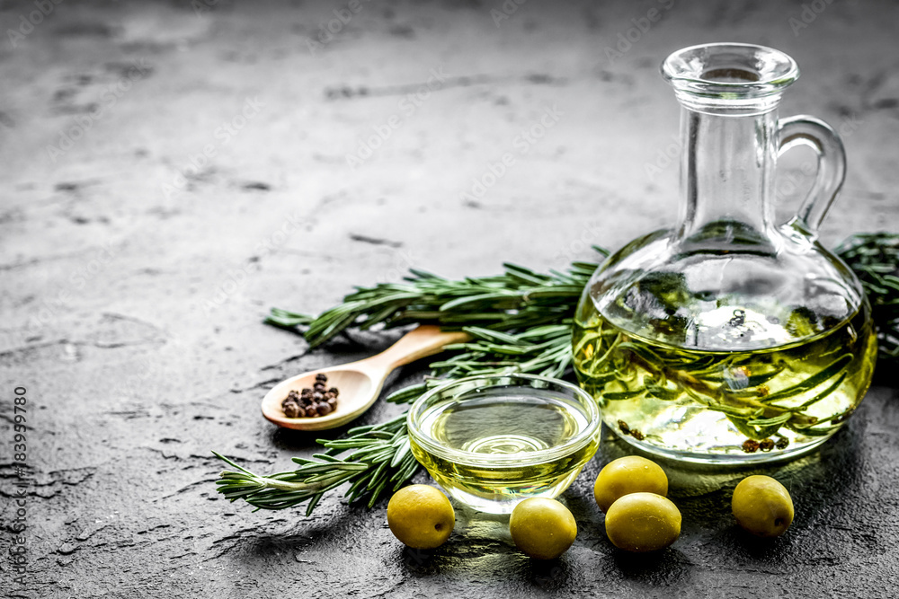 oil in carafe with spices and olive on stone background mock-up