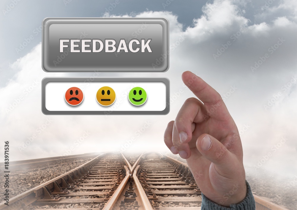 Hand pointing at feedback button and smiley faces review on