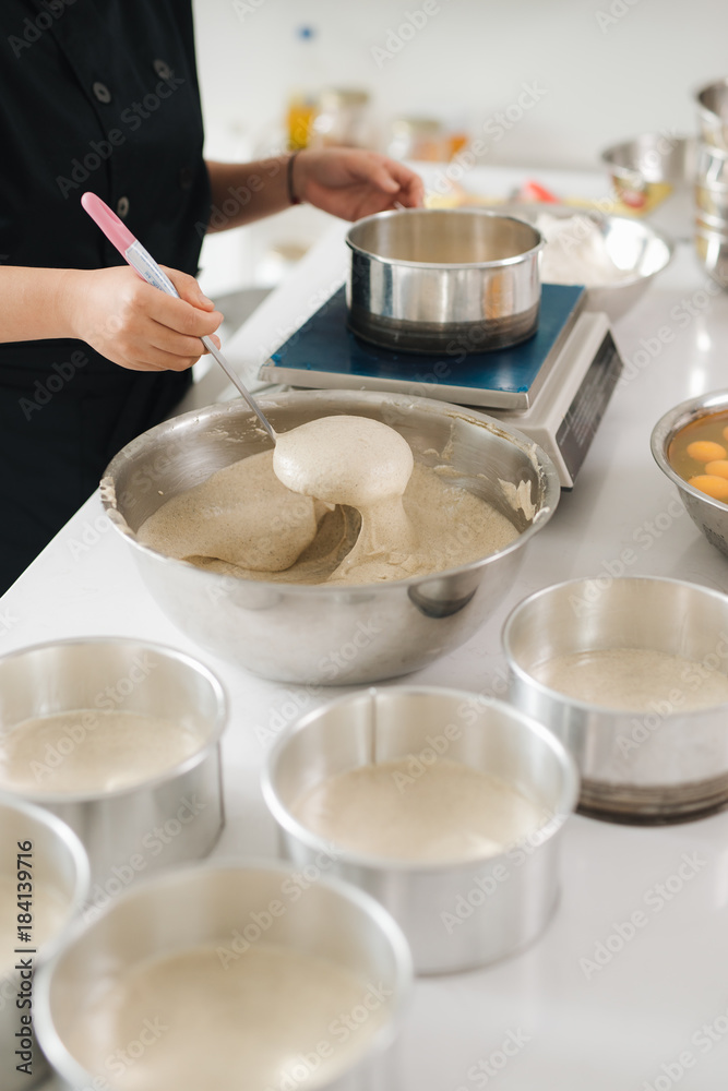 Bakery chef cooking bake in the kitchen professional