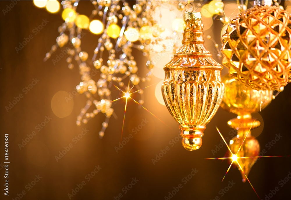 Christmas and New Year golden decorations. Abstract blinking holiday background