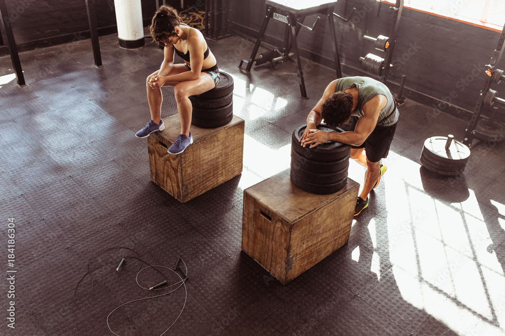 Couple resting after intense physical training