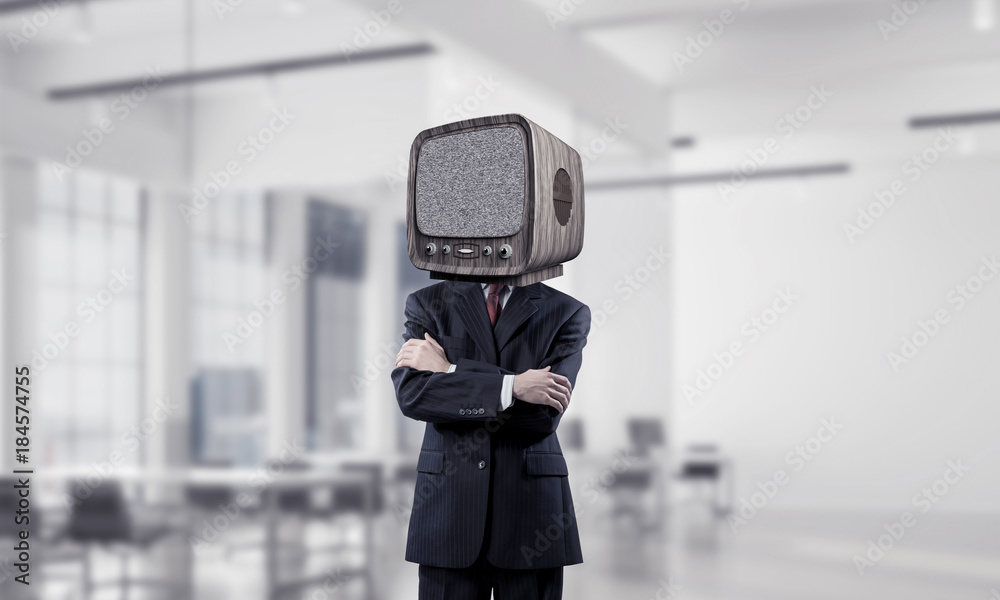 Businessman with old TV instead of head.