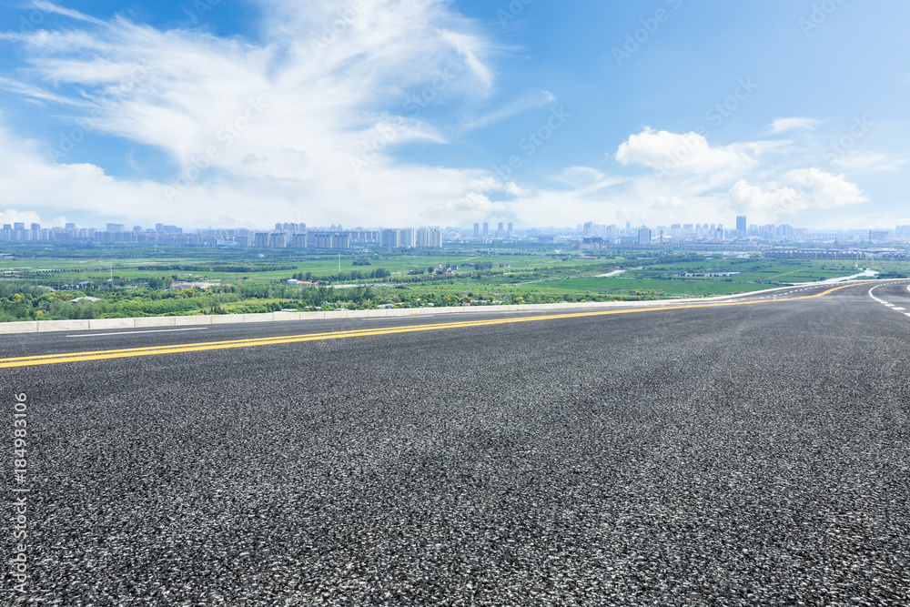 Empty highway asphalt road and beautiful sky clouds landscape