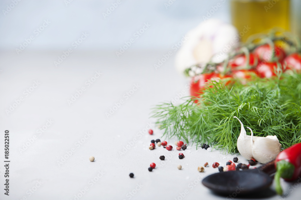 Fresh vegetables over concrete background