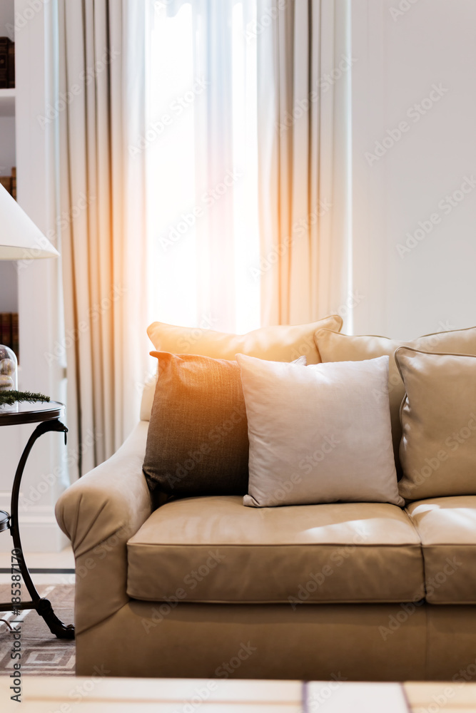 contemporary interior of Living room with part of sofa in sunny day and white curtain interior desig