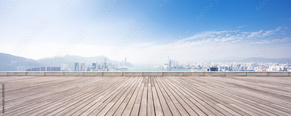 empty marble floor with cityscape of modern city