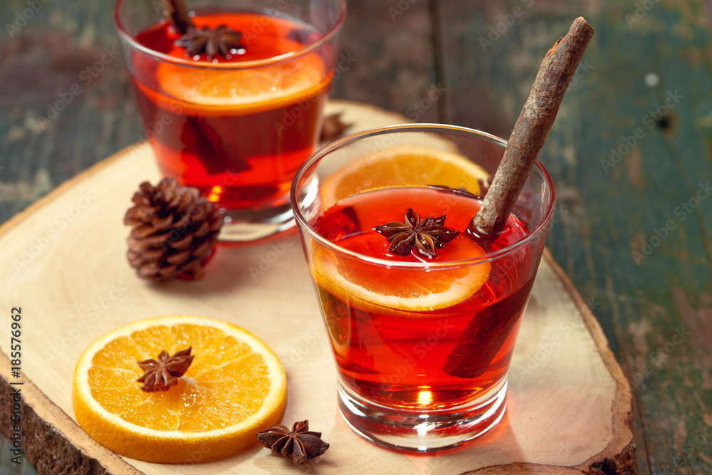 Christmas mulled wine on a rustic wooden table. Holidays concept.