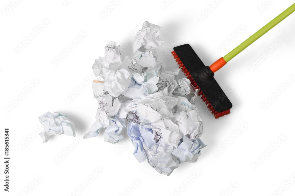 Broom Sweeping Crumpled Paper