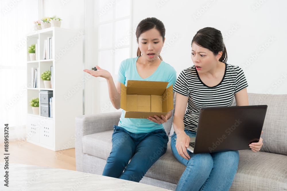 young pretty girl showing empty parcel box