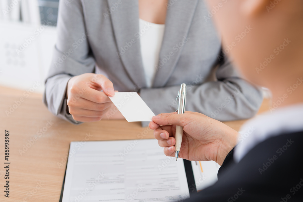 company office worker exchanging business card