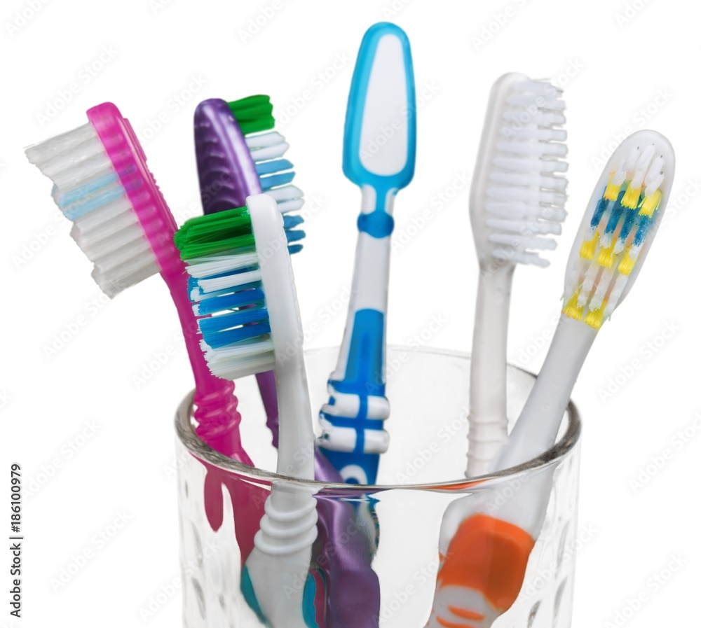 Toothbrushes in a Glass