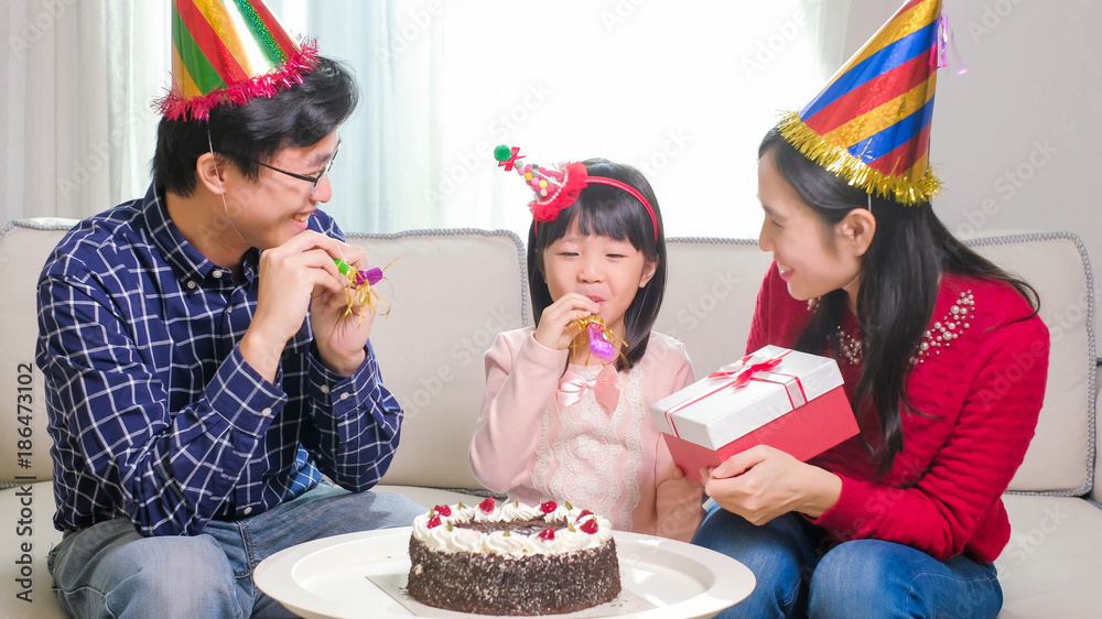 happy family with birthday cake