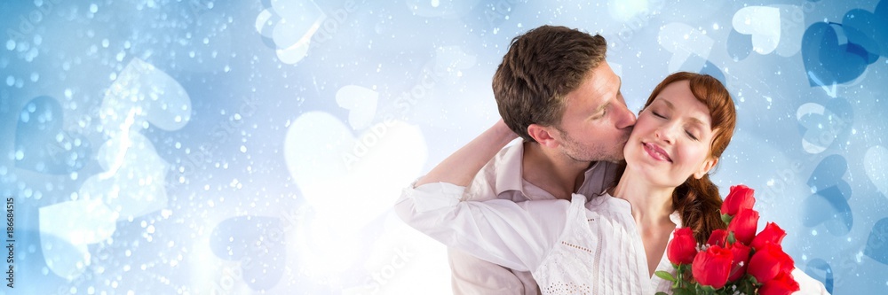 Valentines couple holding roses with love hearts background