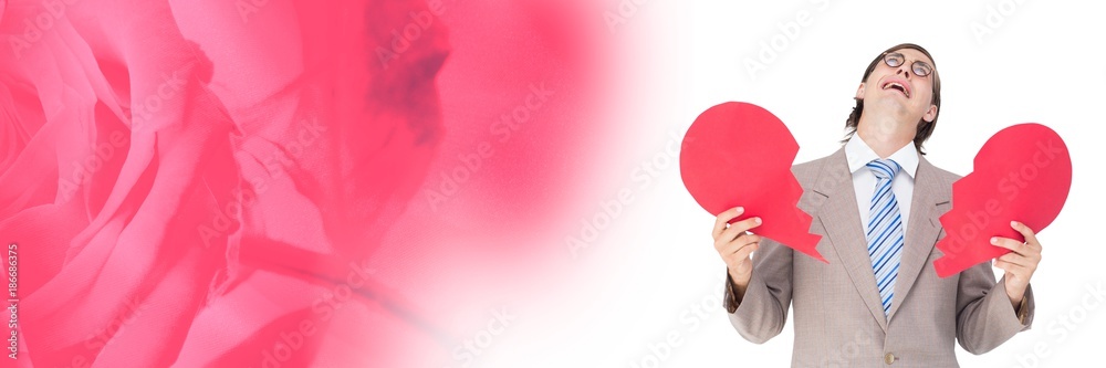 Valentines man breaking heart with rose background