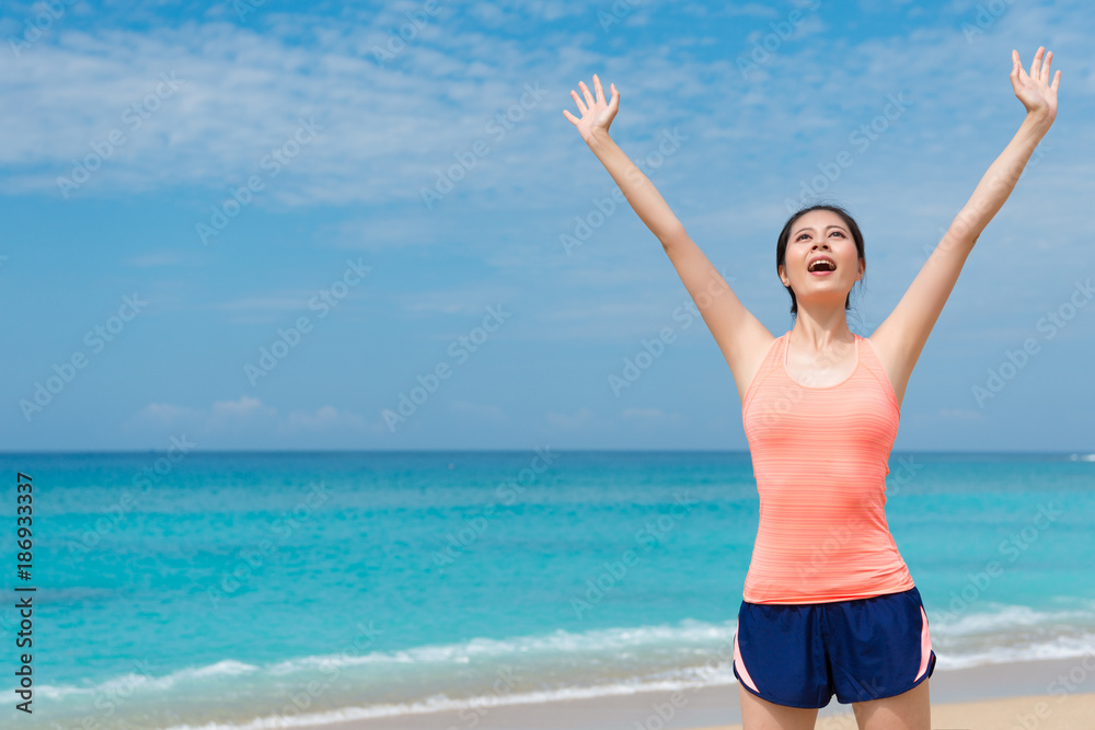 happy beautiful female traveler going to beach