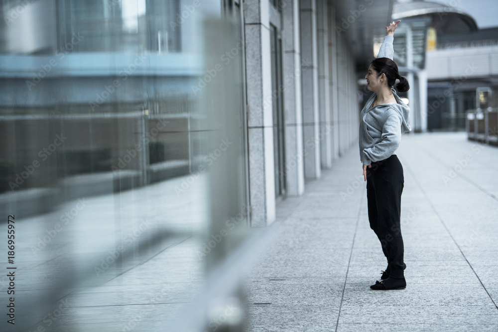 Woman dancing in the city