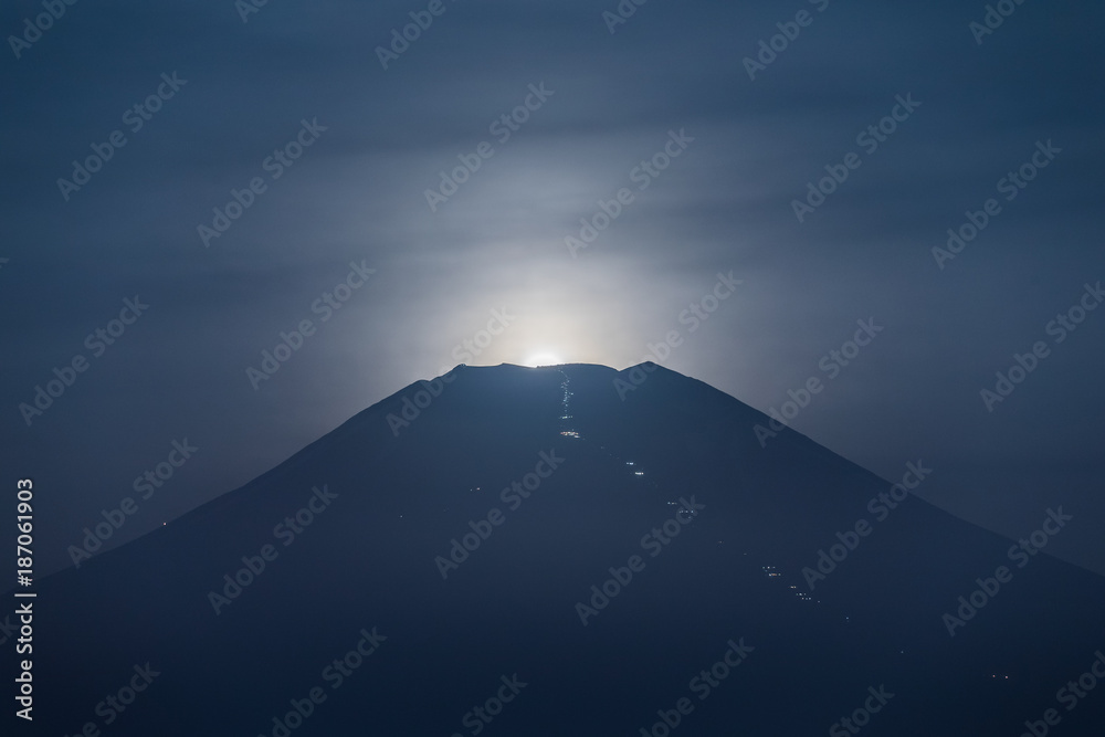 Moon set at top of Mt. Fuji in summer night