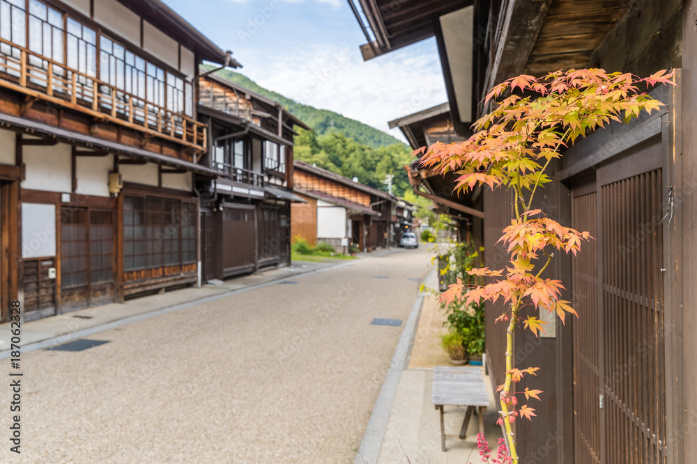  View of old Japanese town with traditional wooden architecture. Narai-juku post town in Kiso Valley