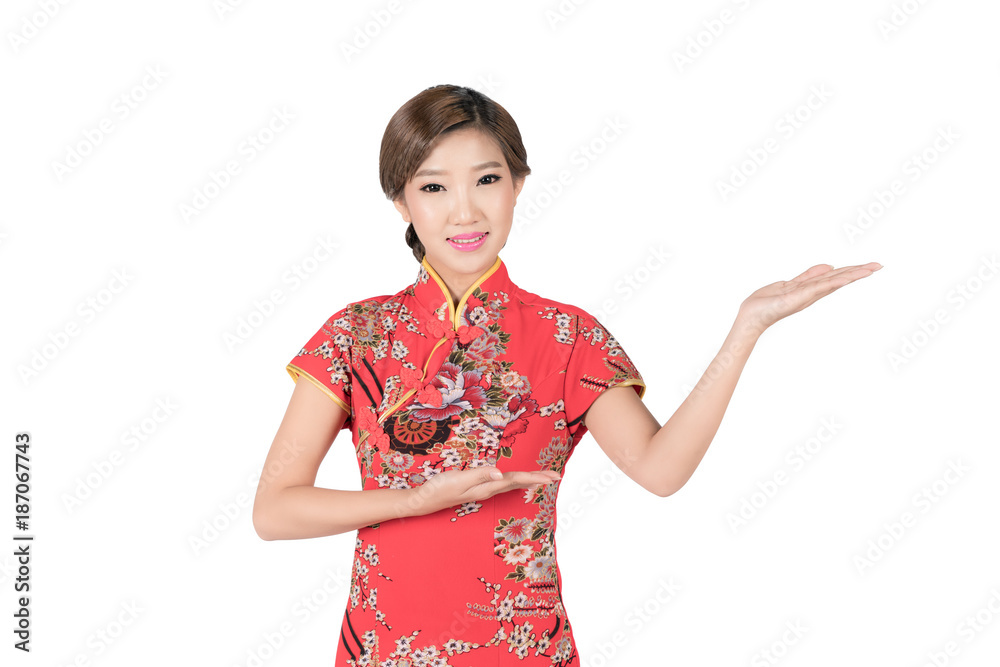 Pretty Asian female with Chinese traditional dress cheongsam or qipao hand showing blank space. Chin