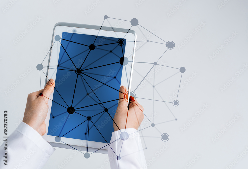 Close of female doctor hands working with tablet pc computer