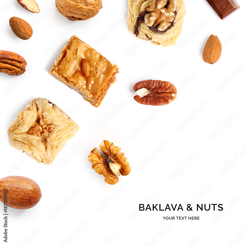 Creative layout made of baklava and nuts. Flat lay. Food concept. Baklava, almonds, pecan and walnut