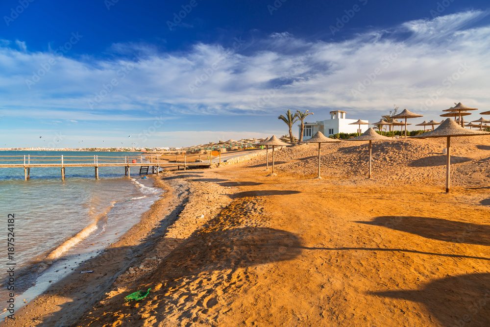 Parasols on the beach of Red Sea in Hurghada, Egypt