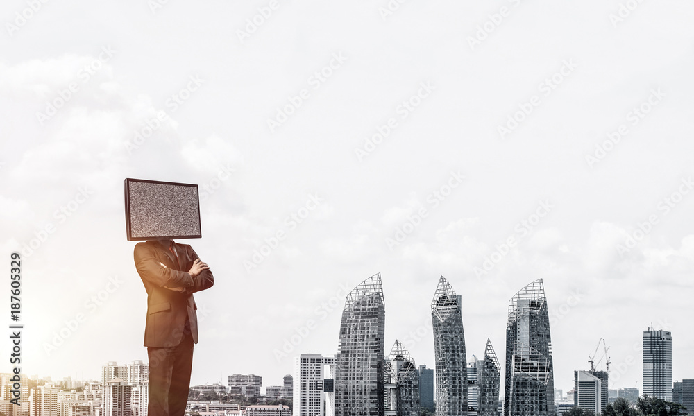 Businessman with TV instead of head.