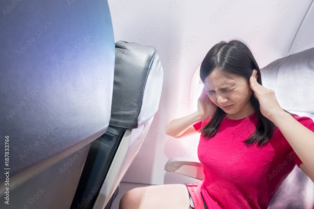 woman feel tinnitus in airplanes