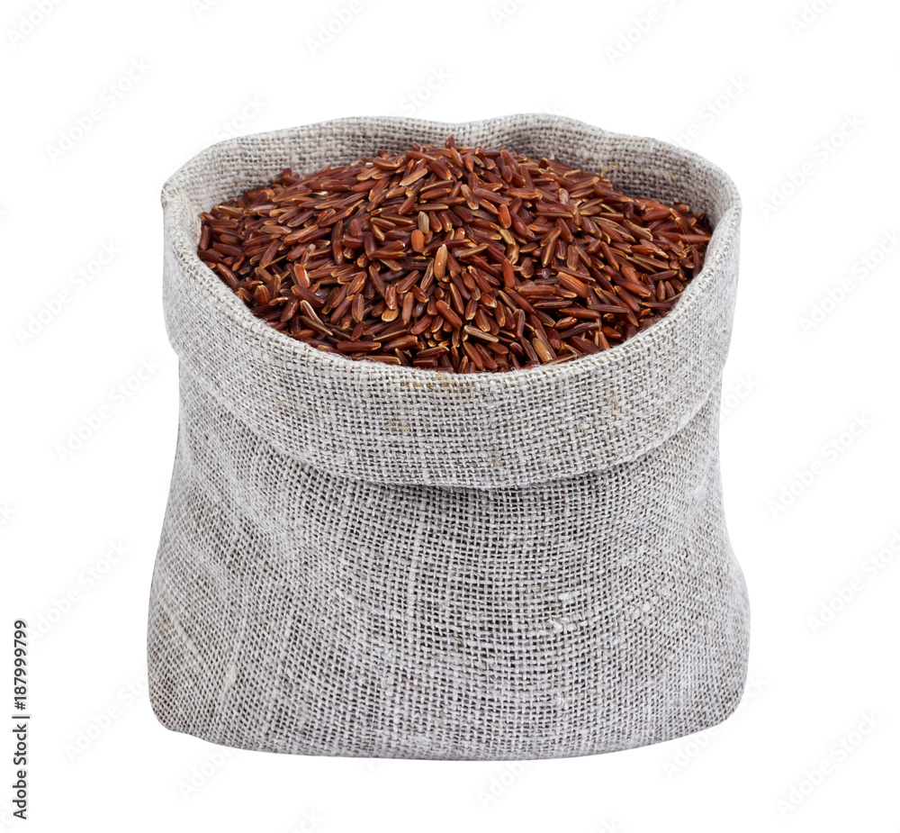 Red rice in bag isolated on white background