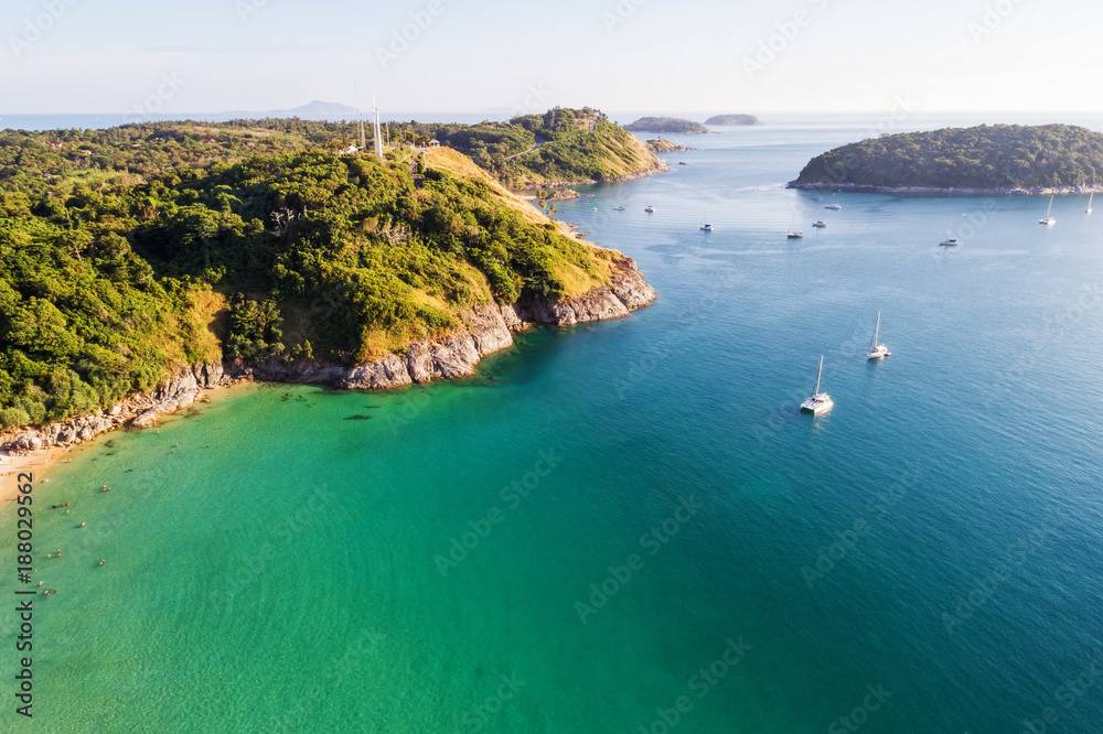 Aerial shot of beauty bay nature landscape with island, yachts and clear sea with turquoise water on