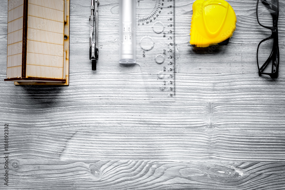 architect working desk on wooden background top view mock up