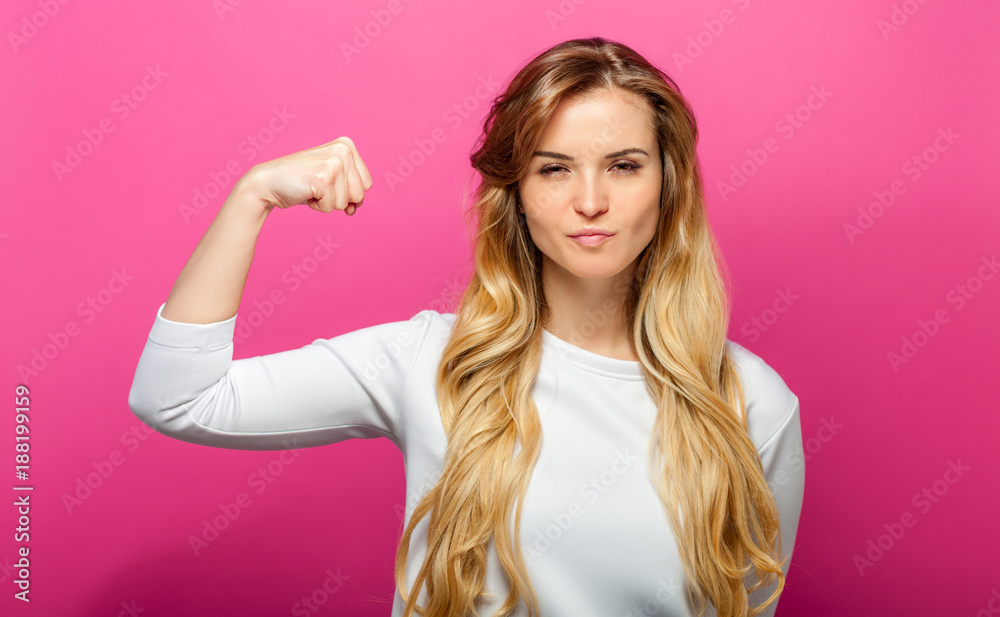 Successful woman raising hand in success gesture