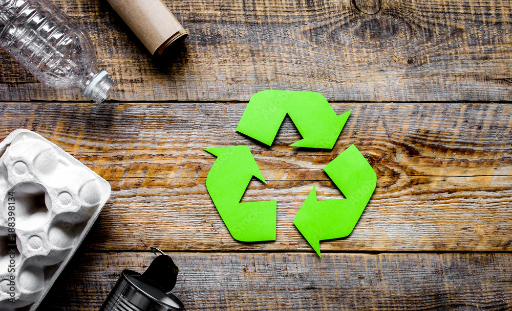 environment concept with recycling symbol on rustic background t