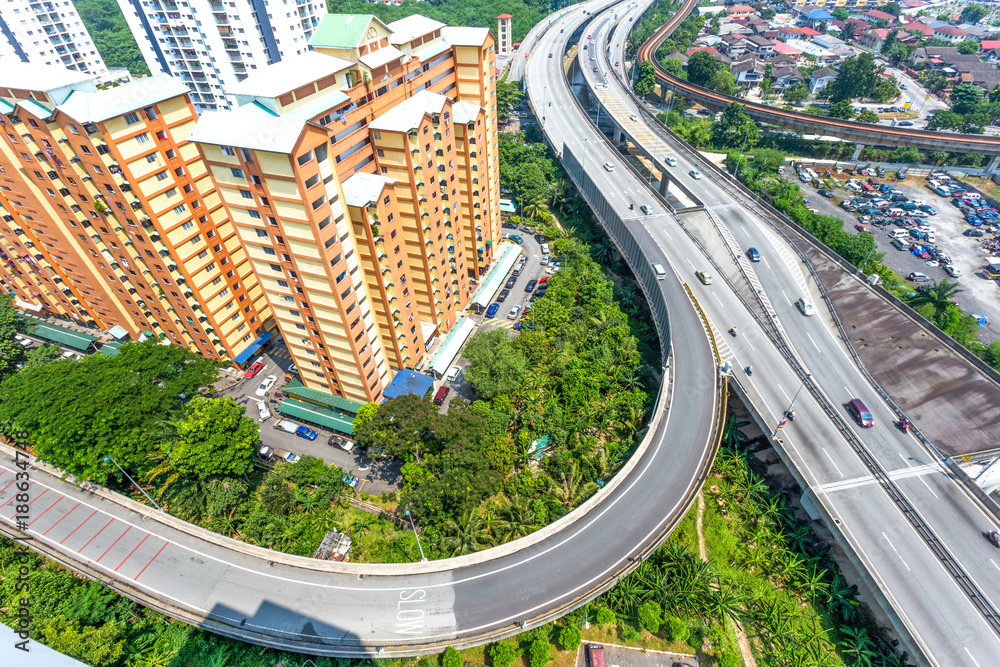 aerial view of modern residential buildings and elevated road