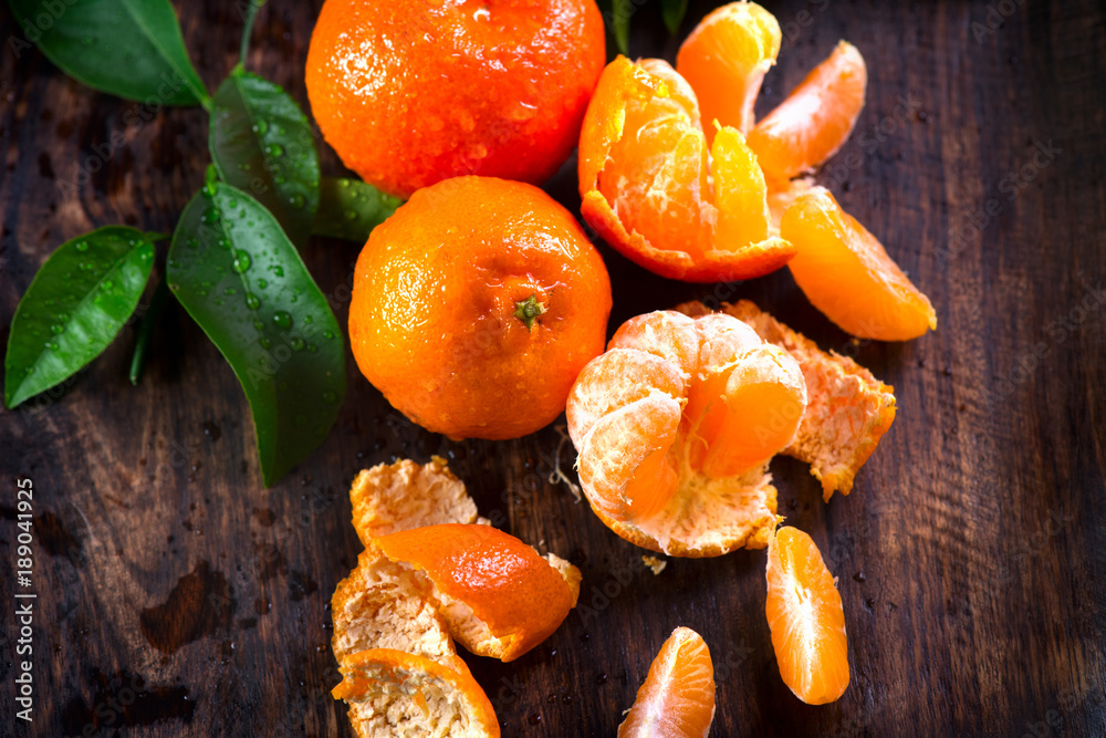 Tangerines. Fresh organic ripe mandarines closeup on wooden table. Top view