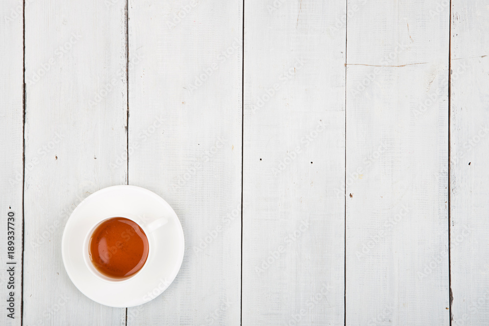 Cup of tea on wooden background