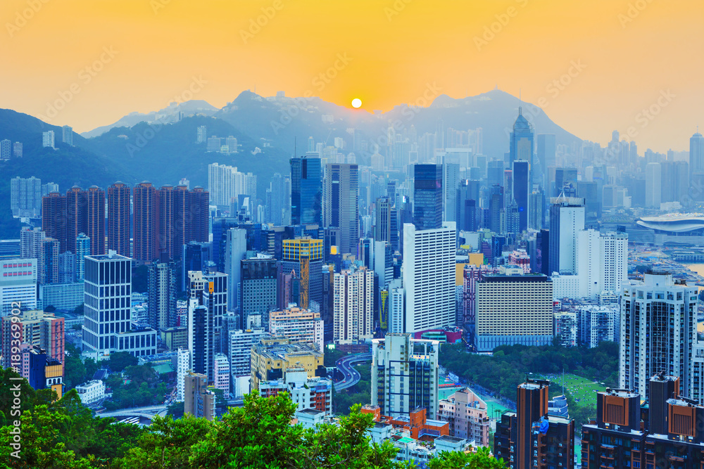 Amazing view on Hong Kong city skyline and the Victoria peak at the sunset, China