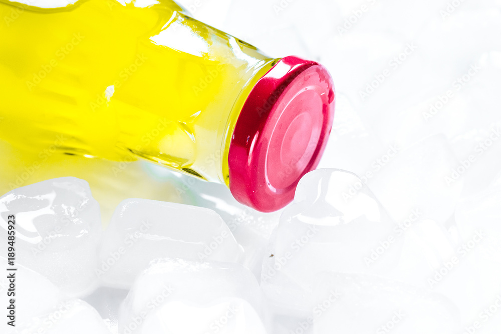 fruit drinks in colorful plastic bottles with ice mock-up