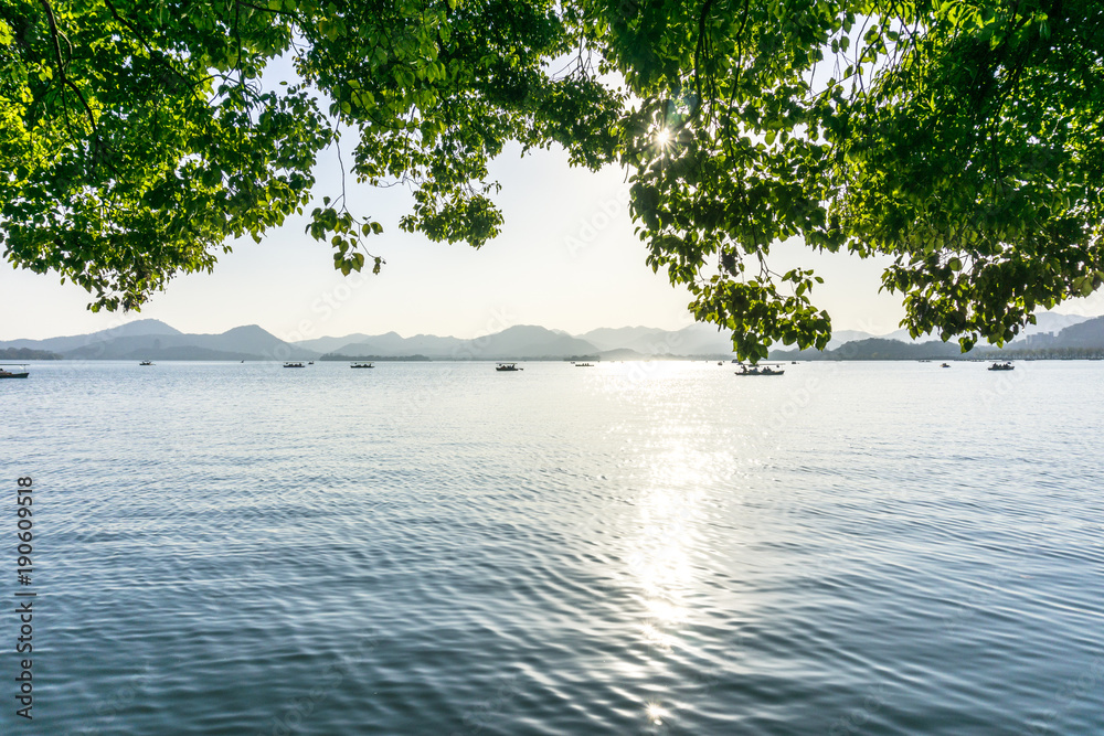 west lake in hangzhou during sunset